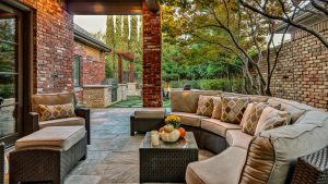 a patio with a couch and a table