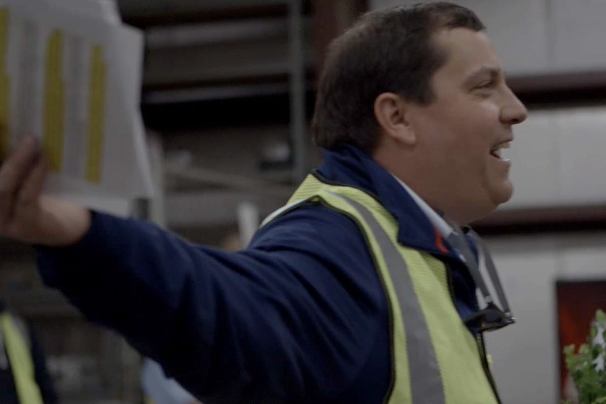 Complete Landsculpture employee smiling and talking